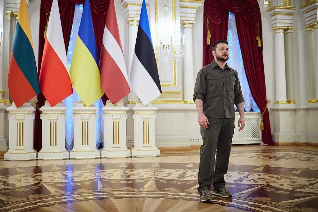President of Ukraine, Zelensky, with Baltic countries flags behind him