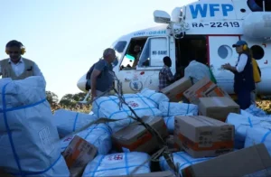WFP workers managing aid supplies.