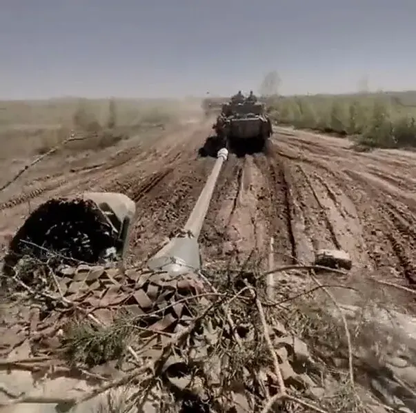 View from an armed tank advancing on a dirt road, near Robotyne.