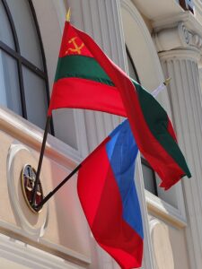 Transnistrian and Russian flags on facade in Tiraspol, capital of the separatist region of Transnistria.