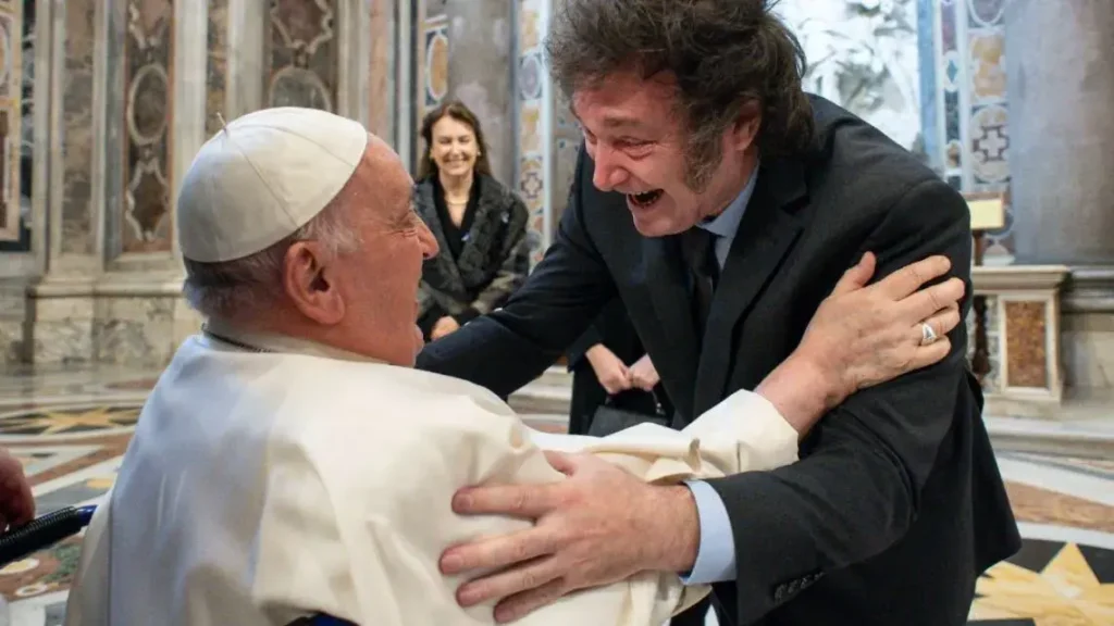 Pope Francis greeting President Javier Milei. 