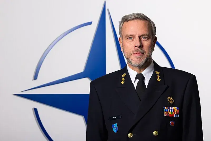 Head of NATO's Military Committee, Rob Bauer, with the NATO logo behind.