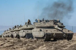 Israeli Merkava tanks forming a line.