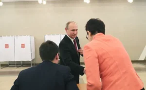 Russian President Vladimir Putin voting in past elections.