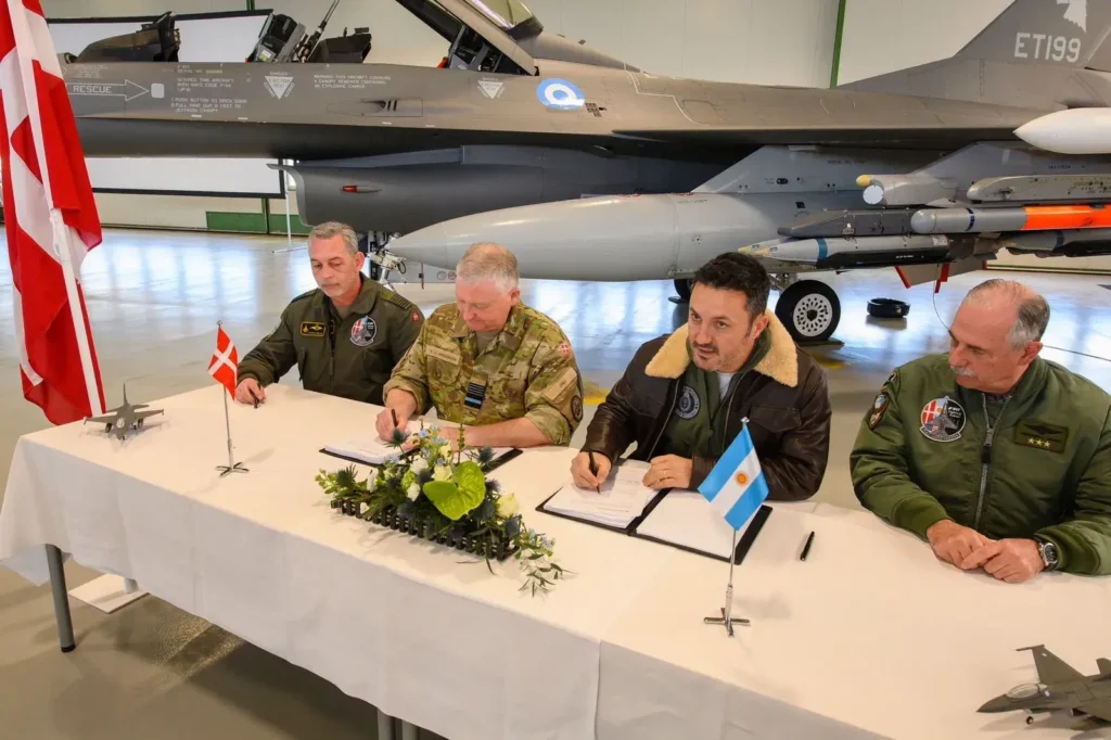 Argentine Defense Minister, Luis Petri, signing the purcharse.