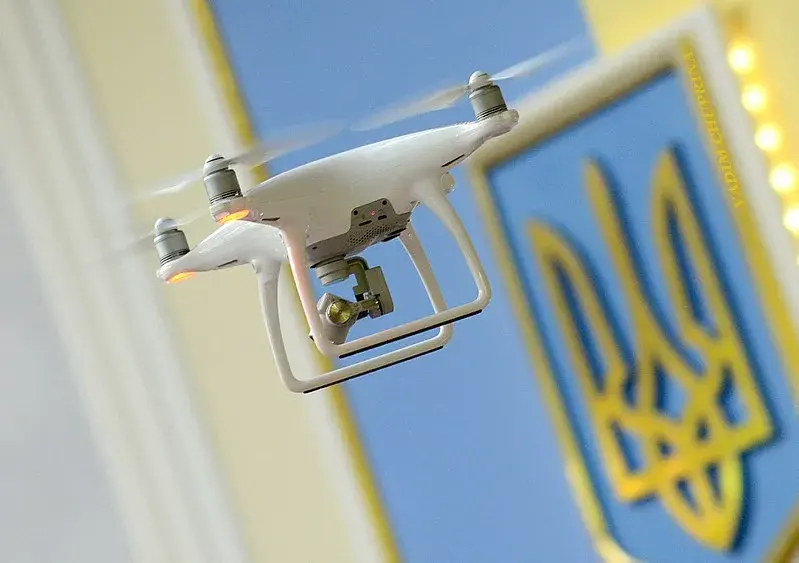 Drone with the symbol of Ukraine behind.
