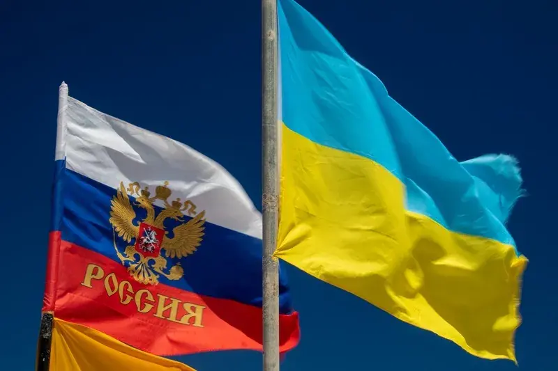 Russia and Ukraine flags.